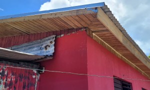 CCRP member Monica McNeil donation of a repaired roof for an elderly Clarendon couple